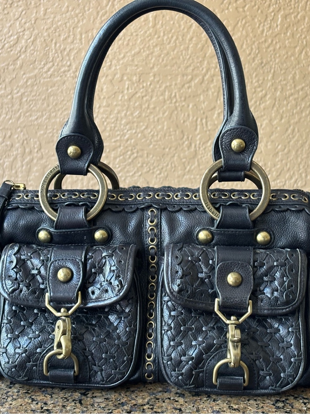 Isabella Fiore Black Leather Satchel with Gold Hardware and Woven Front Pockets